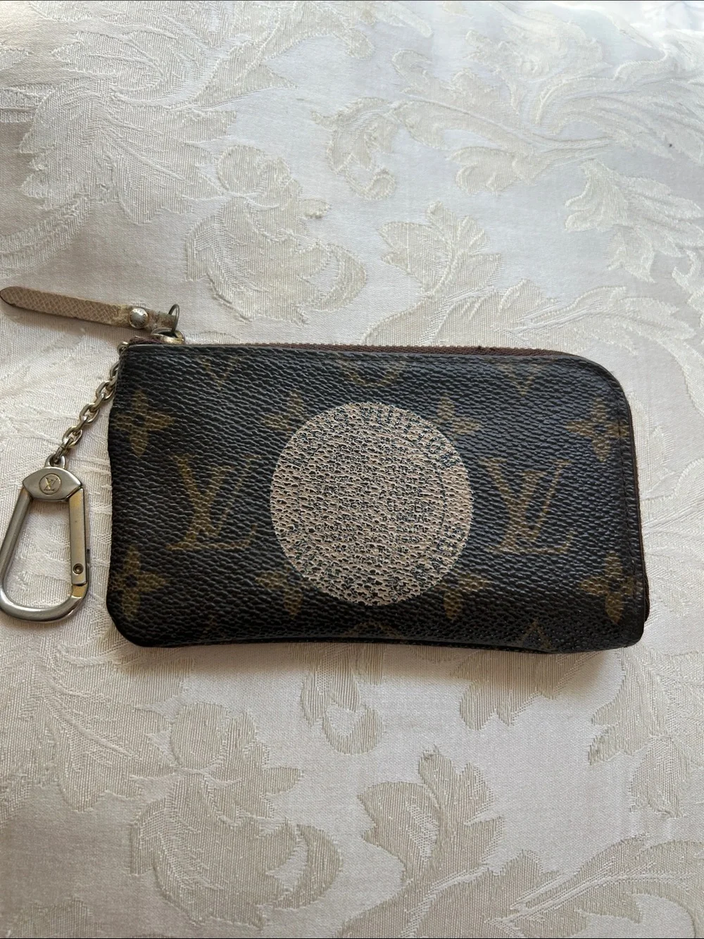 7066. Authentic Louis Vuitton Trunks & Bags Monogram Key/Coin Purse. Comes w/COA